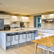 View of kitchen which has been designed by countertop, interior design, kitchen, real estate, room, orange, gray