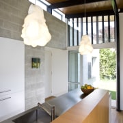 iew of a kitchen which features a kitchen architecture, ceiling, countertop, daylighting, house, interior design, kitchen, loft, table, white