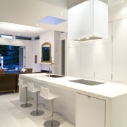 View of kitchen which features a kitchen island countertop, interior design, kitchen, product design, room, white