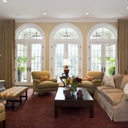 View of the family room which features sofas ceiling, estate, home, interior design, living room, real estate, room, window, gray