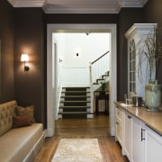 View of a side room with bench seating, floor, interior design, room, black, gray