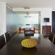 View of dining area featuring large dark stained architecture, interior design, living room, real estate, room, white, black