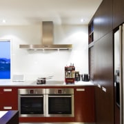 View of open-planned kitchen which features a kitchen cabinetry, ceiling, countertop, cuisine classique, interior design, kitchen, real estate, room, white