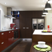 View of open-planned kitchen which features a kitchen countertop, interior design, kitchen, room, gray, black