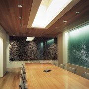 Looking through the board room of the office. architecture, ceiling, daylighting, floor, flooring, hardwood, interior design, lighting, wall, wood, wood flooring, brown