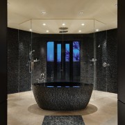 View of freestanding bathtub, featuring limestone tiled flooring architecture, bathroom, ceiling, floor, flooring, interior design, lobby, room, black, brown