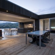 View of the central courtyard which features decking, apartment, architecture, floor, home, house, interior design, penthouse apartment, property, real estate, window, wood, black