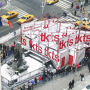 View of the new TKTS ticketing booth in city, crowd, white, gray