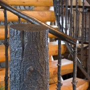 Images of a stairway featuring railing which has beam, handrail, iron, lumber, wood, black, orange