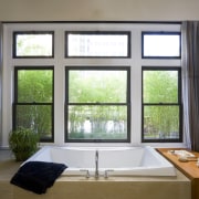 View of bathtub which is set into a curtain, daylighting, home, house, interior design, real estate, room, sash window, window, window covering, window treatment, wood, black