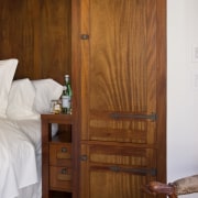 Image of Mahogany woodwork designed by Glenn Pope bedroom, cabinetry, chest of drawers, door, floor, flooring, furniture, hardwood, interior design, room, wall, wardrobe, wood, wood flooring, wood stain, brown