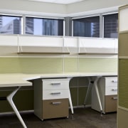 Interior view of an office which includes office desk, furniture, office, product design, table, brown, gray