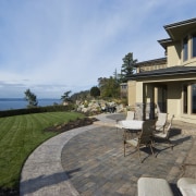 Images of the exterior of this home with cottage, estate, home, house, property, real estate, villa, walkway, teal