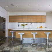 View of kitchen which features cabinetry designed and cabinetry, ceiling, countertop, floor, flooring, interior design, kitchen, real estate, room, tile, wall, gray