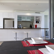 Image of kitchen and dining area which have interior design, kitchen, gray