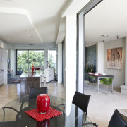 Image of kitchen and dining area which have apartment, ceiling, house, interior design, living room, property, real estate, white