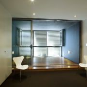 Interior view of Coda apartments featuring sliding doors, architecture, ceiling, daylighting, floor, glass, house, interior design, real estate, room, wall, window, window covering, window treatment, gray