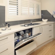 Image of Smeg appliances used in kitchen which cabinetry, countertop, cuisine classique, floor, hardwood, interior design, kitchen, room, wood, white