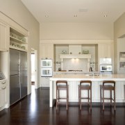 Image of the kitchen designed by Fyfe kitchens ceiling, countertop, cuisine classique, dining room, estate, floor, flooring, hardwood, home, interior design, kitchen, property, real estate, room, table, wood flooring, orange