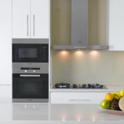 View of kitchen which features a Miele oven, cabinetry, countertop, home appliance, interior design, kitchen, kitchen appliance, kitchen stove, product design, gray, white