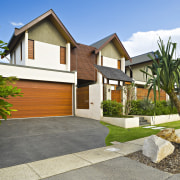 Exterior view of the front of the house cottage, elevation, estate, facade, home, house, neighbourhood, property, real estate, residential area, yard, brown