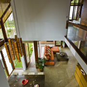 View of the double-height void above the kitchen architecture, daylighting, furniture, home, house, interior design, living room, loft, room, table, wood, brown, gray