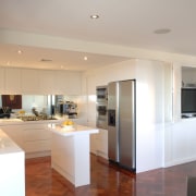 View of a penthouse kitchen which was designed countertop, interior design, kitchen, real estate, gray