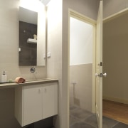 View of bathroom with vanity and toilet, features bathroom, bathroom accessory, floor, interior design, plumbing fixture, product design, room, sink, brown, white