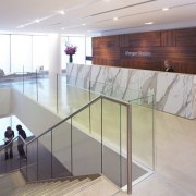 Interior view of offices where the interior fit-out floor, flooring, glass, handrail, interior design, lobby, table, gray