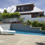 Image of the pool which has been designed apartment, architecture, estate, facade, home, house, property, real estate, residential area, swimming pool, villa, window, white