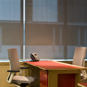 Interior view of the Trinity Group's offices which chair, desk, furniture, interior design, office, table, wood, brown