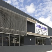 Image of John Barnes and Company. The OFS architecture, building, commercial building, corporate headquarters, facade, real estate, black, white