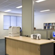 Image of desk and shelving supplied by The furniture, interior design, office, product design, gray