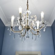 Powder room, featuring chandelier. - Powder room, featuring ceiling, chandelier, decor, light fixture, lighting, lighting accessory, gray, white