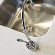 view of a show home kitchen where the body jewelry, jewellery, product design, tap, water, white