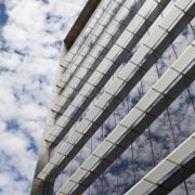 Exterior view of the eco-friendly commercial office tower angle, architecture, building, commercial building, condominium, corporate headquarters, daylighting, daytime, facade, headquarters, landmark, line, metropolis, metropolitan area, reflection, residential area, sky, skyscraper, structure, tower block, urban area, window, white