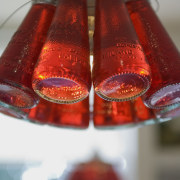 View of the light fittings made from Campari bottle, red, gray