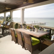 View of an outdoor kitchen at a seaside interior design, outdoor structure, patio, property, real estate, resort, roof, table, white, brown