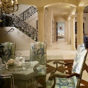 View of the formal dining room which features ceiling, furniture, home, interior design, living room, lobby, room, table, brown, orange