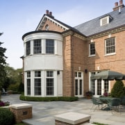 Exterior view of Georgian-style home with brick cladding, building, cottage, elevation, estate, facade, home, house, mansion, property, real estate, residential area, roof, suburb, window, gray