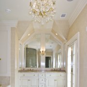 View of the master bathroom vanity with white ceiling, daylighting, estate, home, interior design, lobby, molding, property, room, wall, gray