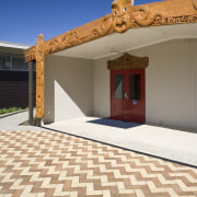 Image of paving completed by P and M estate, facade, floor, home, outdoor structure, property, real estate, roof, sky, orange