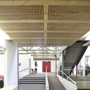 Image of Te Whanau o Tupuranga school which architecture, ceiling, daylighting, roof, structure, brown, white