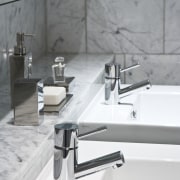 Image of tapware from Robertson Agencies limited which floor, furniture, plumbing fixture, product design, sink, tap, tile, gray, white