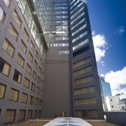 Exterior view of the apartments in Auckland CBD apartment, architecture, building, commercial building, condominium, corporate headquarters, daylighting, daytime, facade, headquarters, landmark, metropolis, metropolitan area, mixed use, real estate, residential area, sky, skyscraper, tower, tower block, urban area, gray