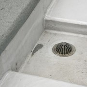 Image of drains supplied by Allproof Industries. Allproof line, gray, white