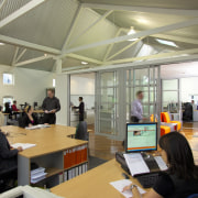 Interior view of the Enabling offices which feature institution, office, gray