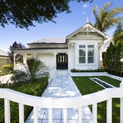 View of white house with light-toned interior with backyard, cottage, estate, facade, home, house, mansion, property, real estate, residential area, villa, white