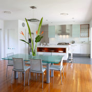 View of the dining and kitchen areas of ceiling, dining room, floor, flooring, furniture, hardwood, house, interior design, kitchen, laminate flooring, living room, real estate, room, table, wood, wood flooring, white, gray