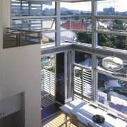 View of the main dining area featuring bamboo daylighting, glass, interior design, window, gray
